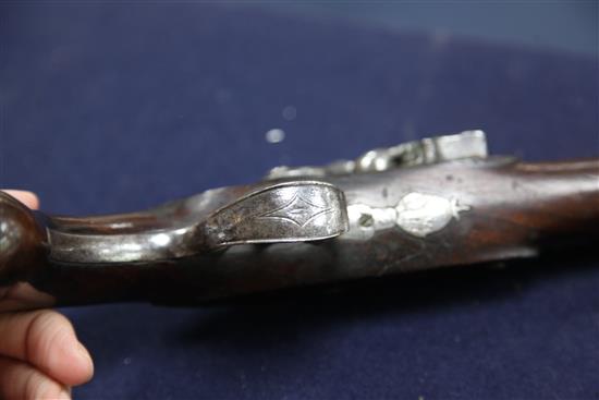 A pair of late 18th century flintlock holster pistols, 15in.